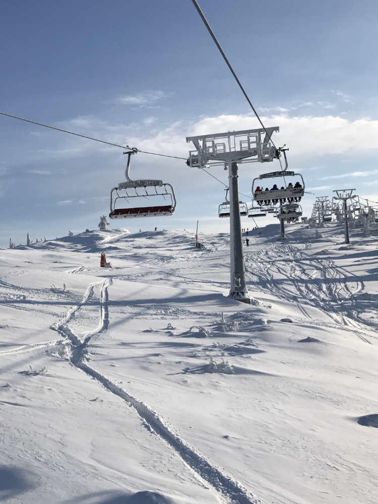 Ski lift in Gautefall over fresh snow with a few ski tracks underneath